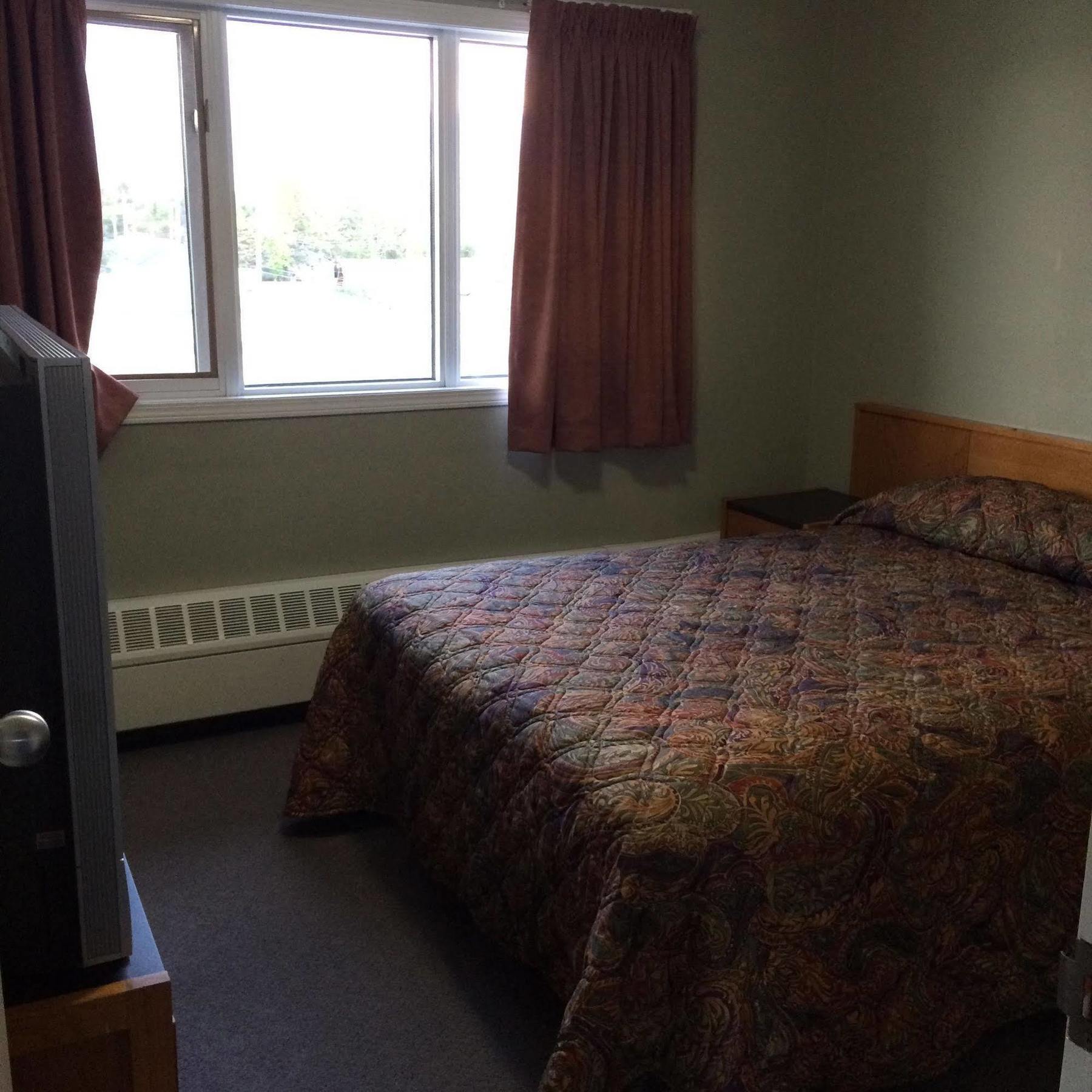 Raccoon Lodge Motel Sylvan Lake Esterno foto